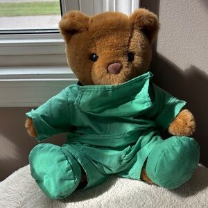 Plush Teddy Bear in Green Outfit